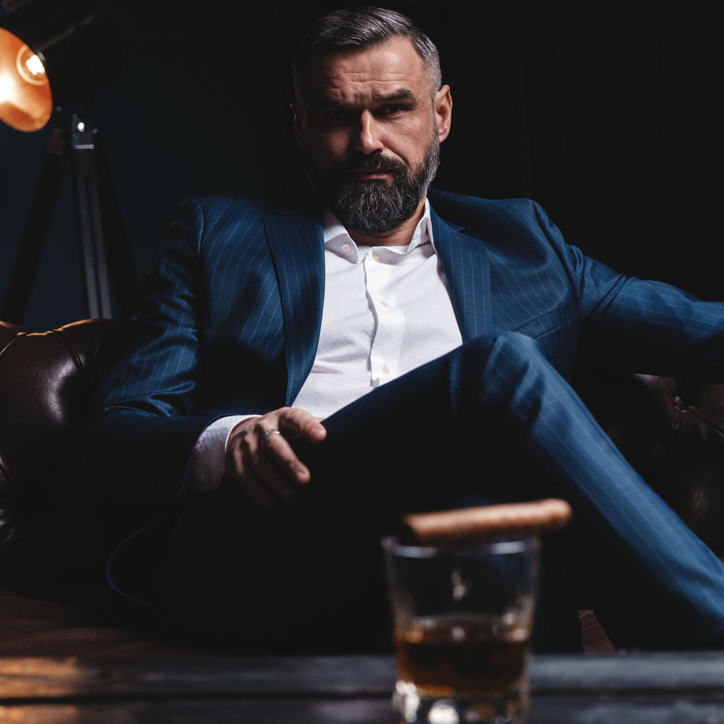 Gentleman with Whiskey Glass and Cigar